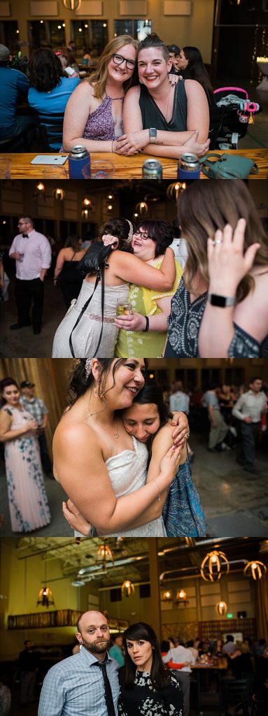 friends hugging at wedding reception