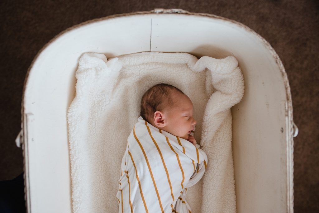 Wyoming newborn in bassinet