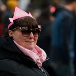 woman in pink crown
